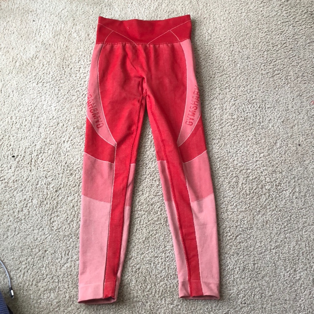 Gymshark leggings size small/0-2. Colors red and pink. Lightly worn.